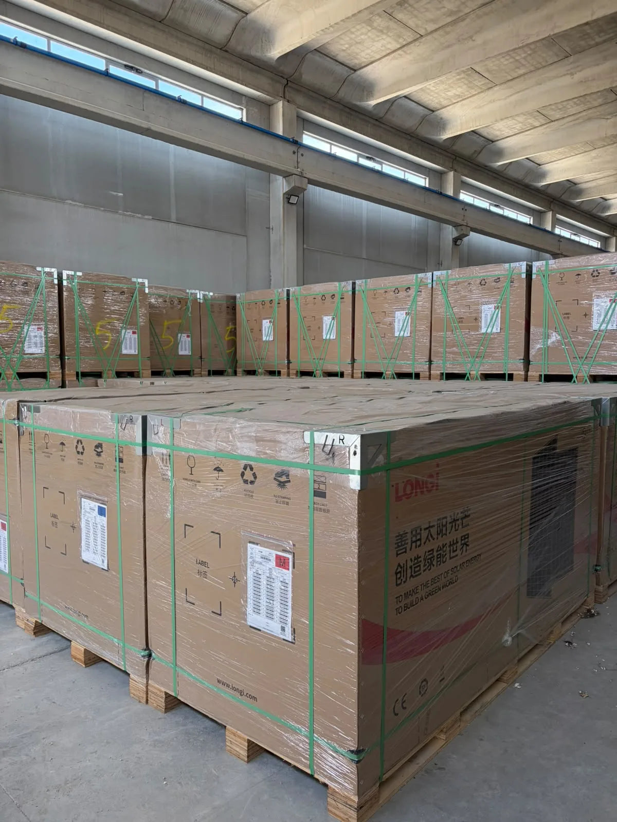 A packaged pallet of Longi solar modules.
